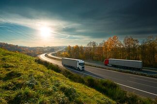 Trucks are driving on the highway