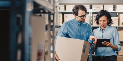 A woman is inspecting an industrial machine A woman is inspecting an industrial machine